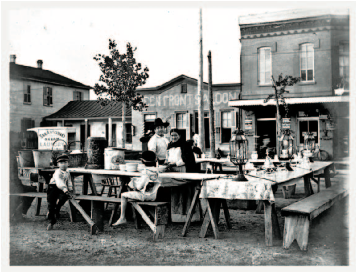 A couple tend to their chili stand in Haymarket Plaza in San Antonio